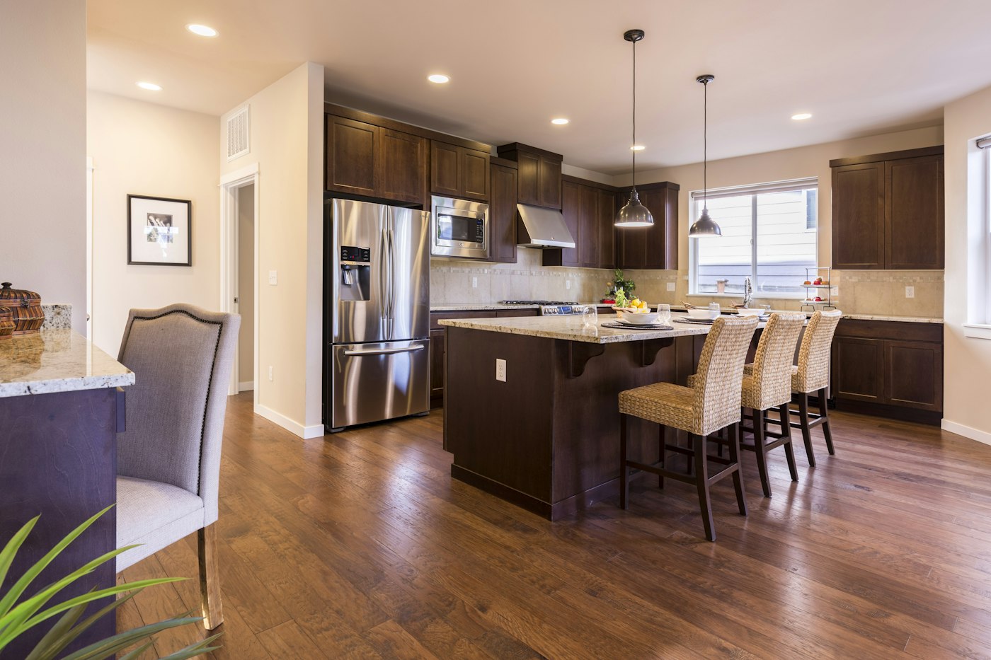 Wood and neutral-toned kitchen with island